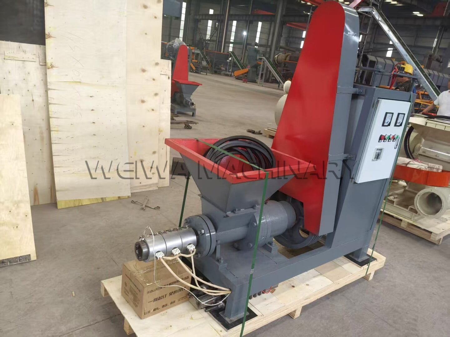 Biomass briquette machine