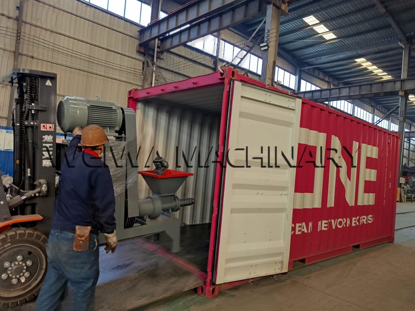 Biomass briquette machine